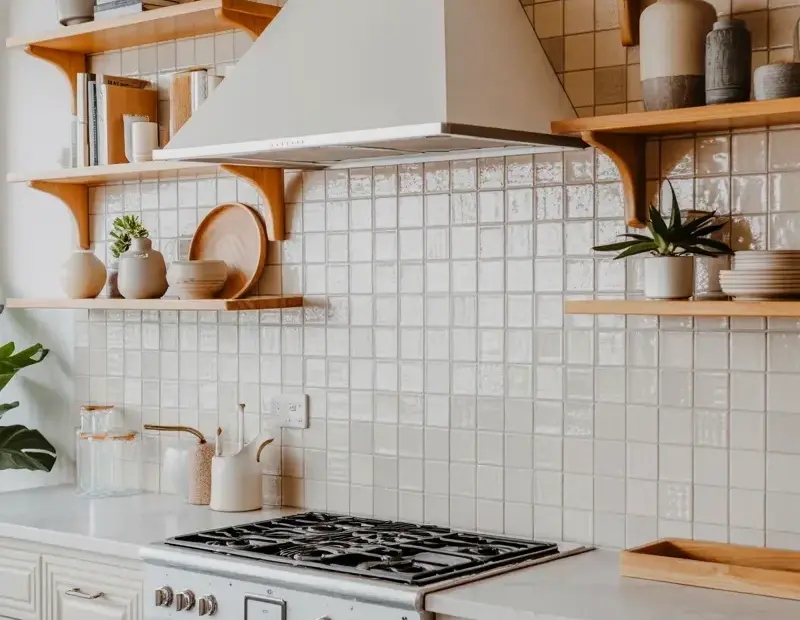 White Gas Range Kitchen with Light Oak Floating Shelves | Cozy Gray Tile Backsplash
